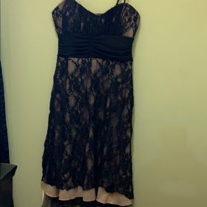 Nude with black lace dress